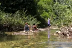 Bamboo rafting on a river during a Khao Lak safari