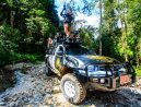 Muddy off-road track through jungle near Khao Lak
