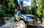 Muddy off-road track through jungle near Khao Lak