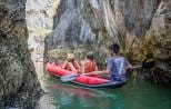 Canoeing through a sea cave in Phang Nga Bay