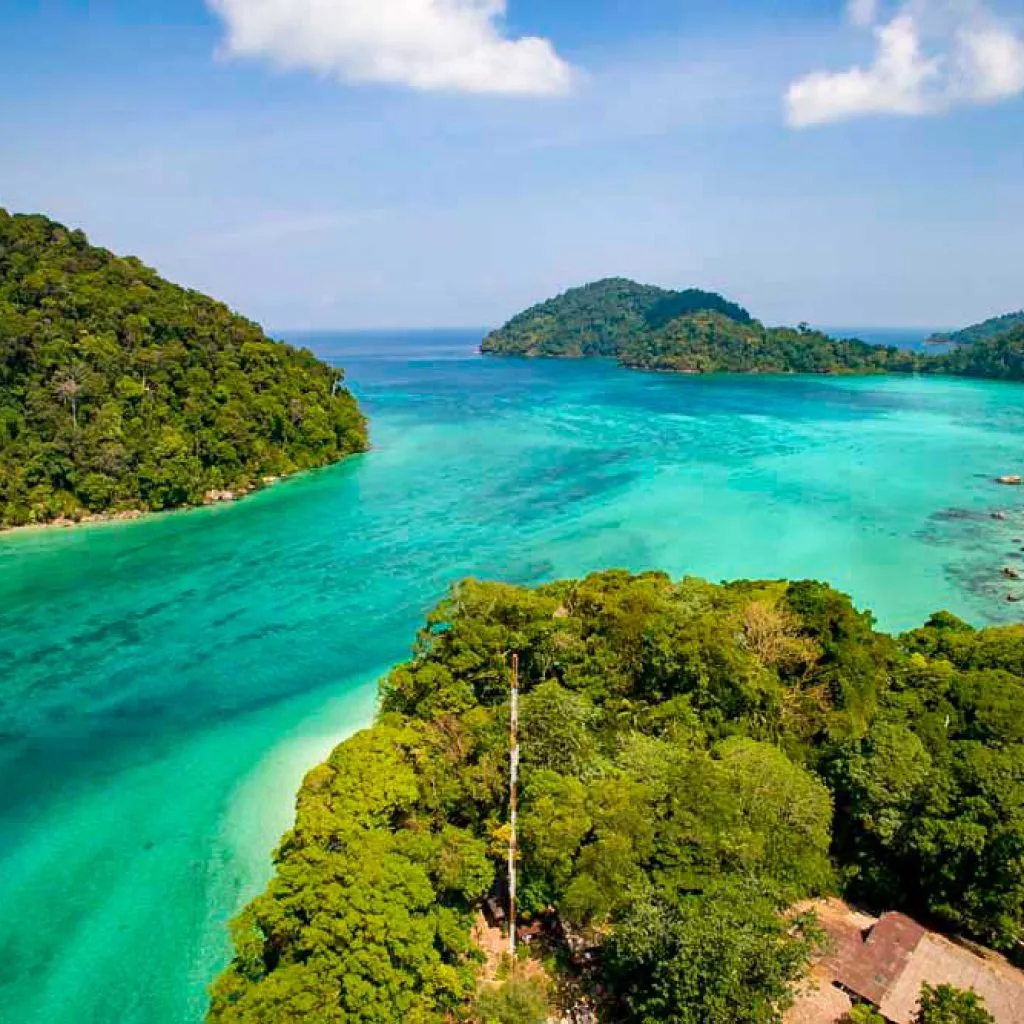 Surin Islands snorkeling day trip — clear water and coral reef at Ko Surin