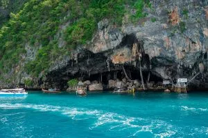 Viking Cave at the foot of the Phi Phi Leh cliffs, seen from the boat on a Phi Phi Islands day trip
