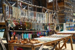 Shell necklaces and handmade souvenirs for sale at a Moken village stall on the Surin Islands