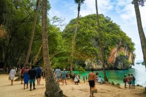 Palm-lined beach and limestone cliff on Koh Hong, a stop on the Krabi 4 Island Tour from Khao Lak