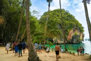 Palm-lined beach and limestone cliff on Koh Hong, a stop on the Krabi 4 Island Tour from Khao Lak