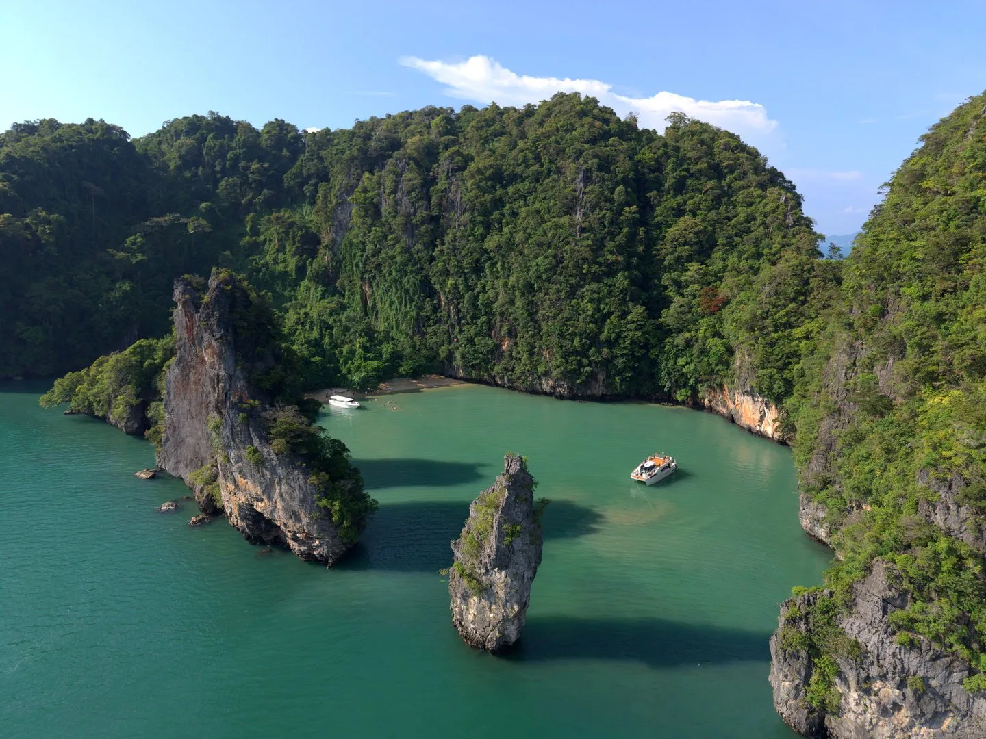 Golden-hour light over the limestone karsts of Phang Nga Bay