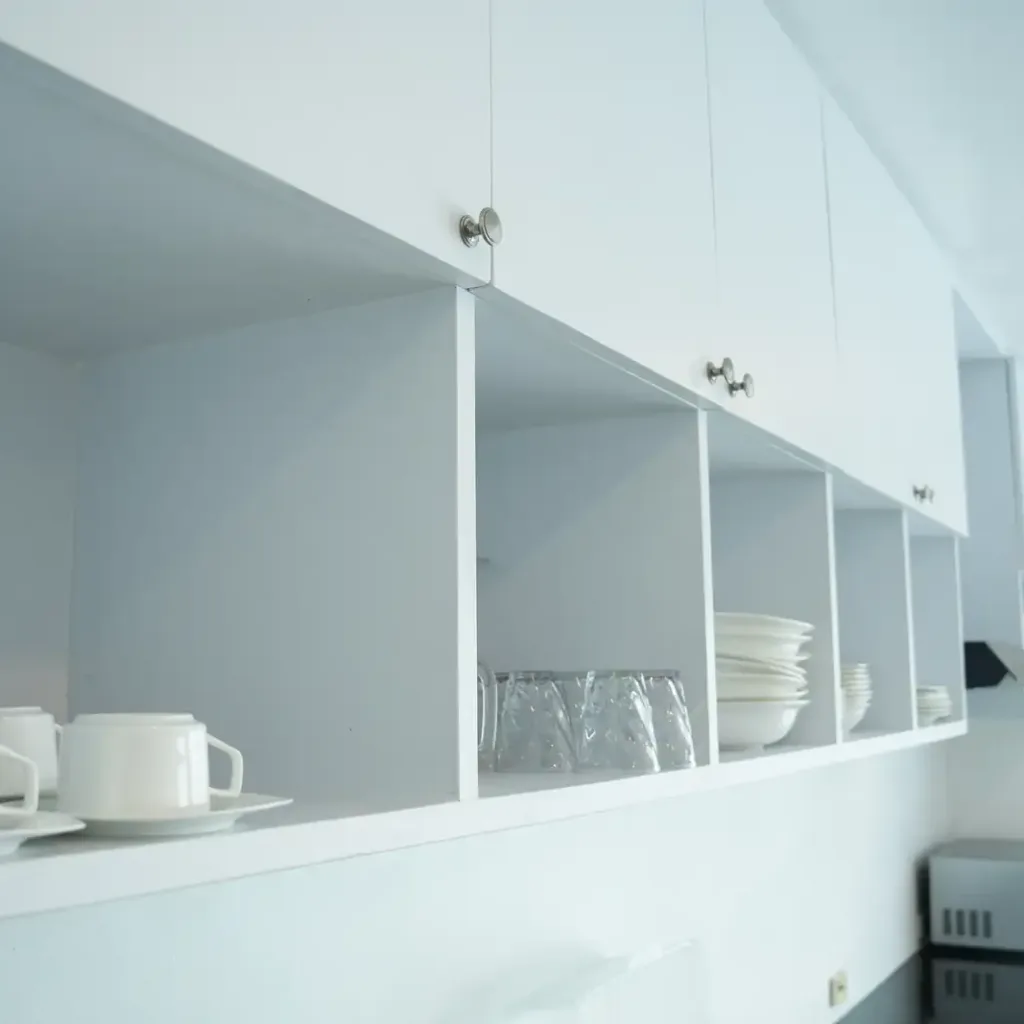 Kitchen open shelving with crockery and glassware