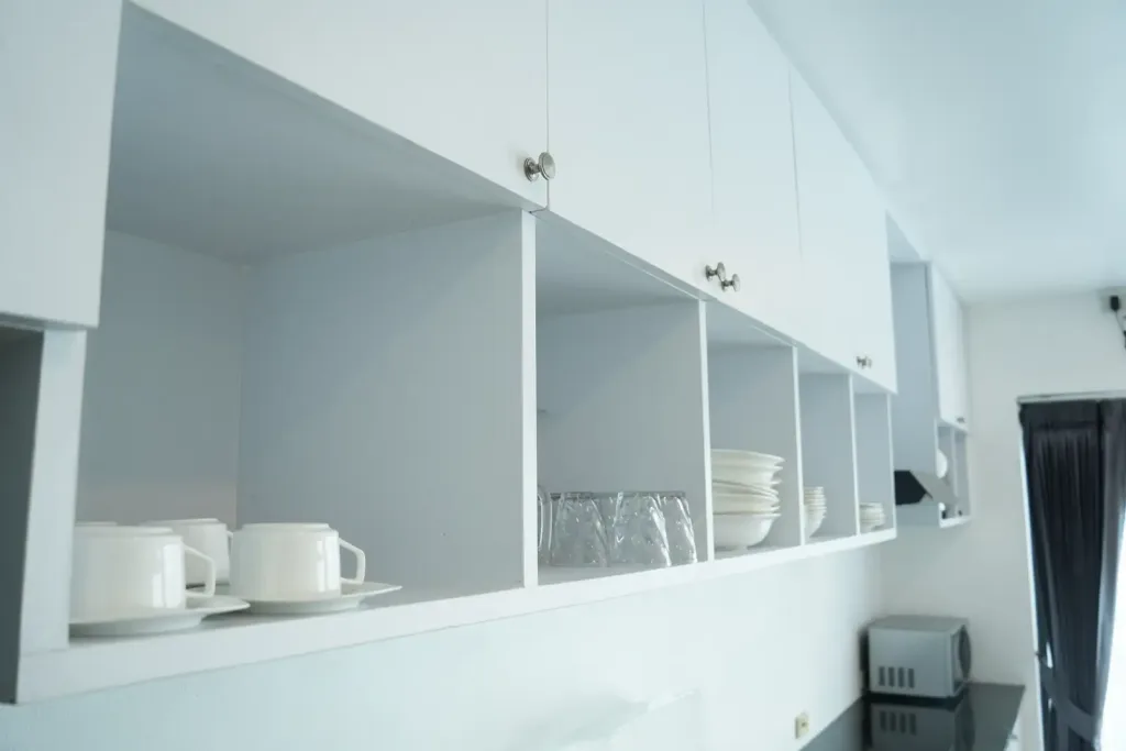 Kitchen open shelving with crockery and glassware