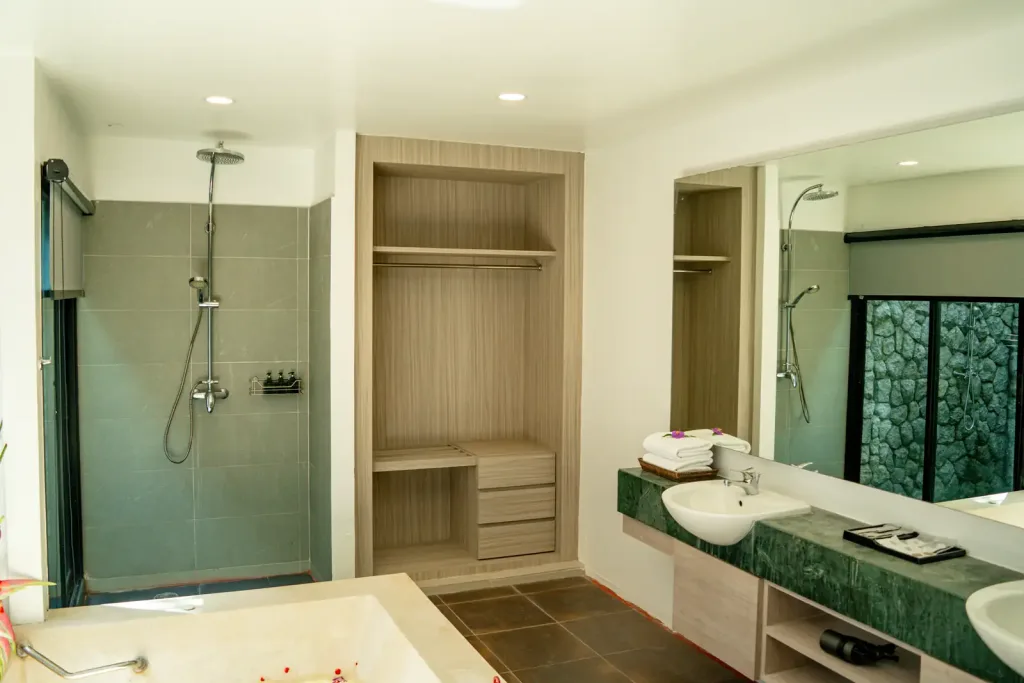 Walk-in shower and twin-vanity bathroom