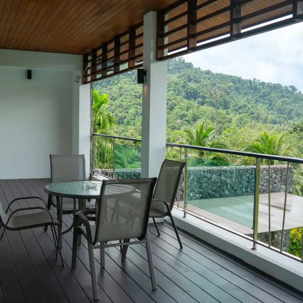 Covered terrace with seating over jungle views