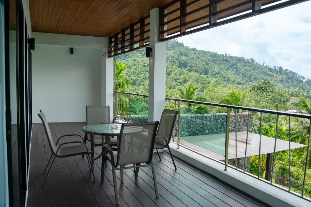 Covered terrace with seating over jungle views