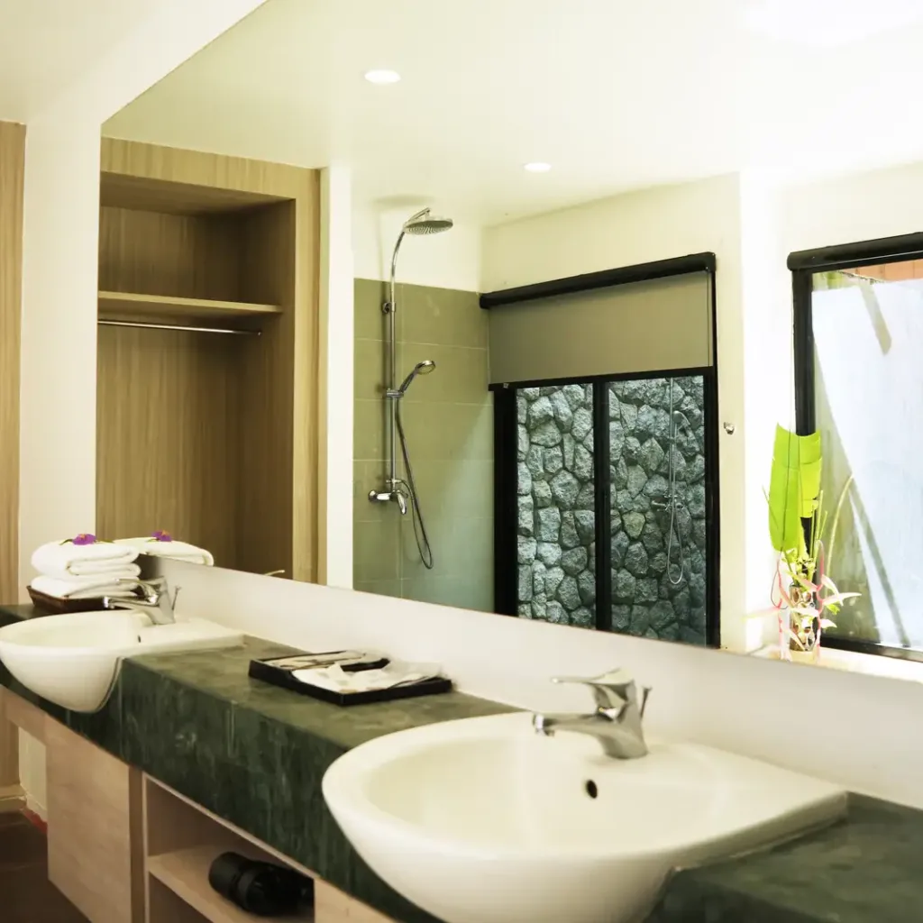 Twin-vanity bathroom with a walk-in shower