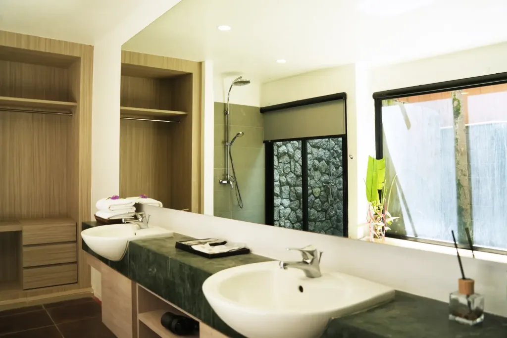 Twin-vanity bathroom with a walk-in shower