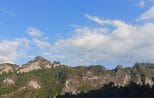 A long jungle-covered limestone ridge stretching across the horizon above Cheow Lan Lake in Khao Sok National Park
