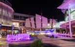 Coloured fountains light up the Jungceylon shopping plaza in Patong during an evening excursion from Khao Lak