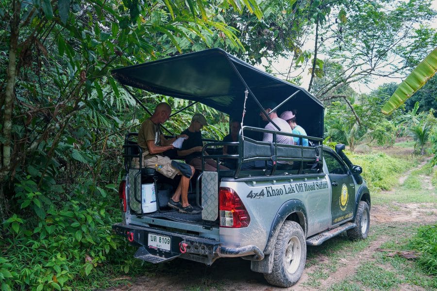 Khao Lak Expedition 4x4 safari truck with guests on a jungle track near Khao Lak