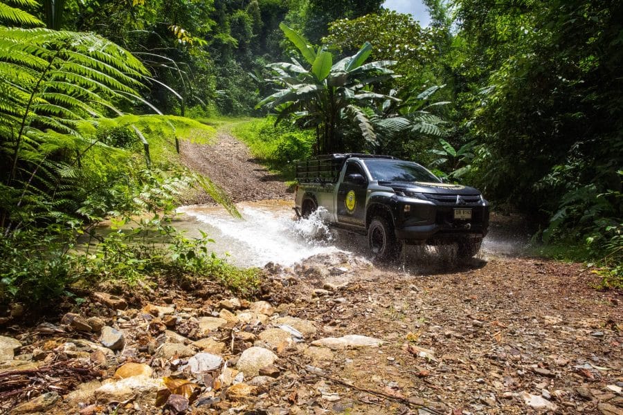Klld 4X4 Off-Road Truck Crossing A Jungle Stream On The Khao Lak Expedition